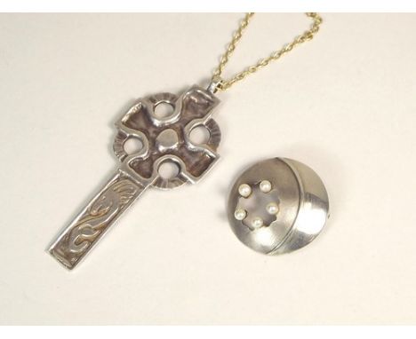 SCOTTISH PENDANT ETC.
A Scottish Celtic cross pendant, Edinburgh 1975, on silver gilt chain & a silver & 'pearl' brooch, Birm