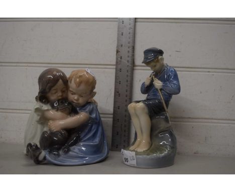 ROYAL COPENHAGEN WARES - MODEL OF TWO YOUNG CHILDREN WITH A PUPPY, TOGETHER WITH A FIGURE OF A SEATED BOY (2)