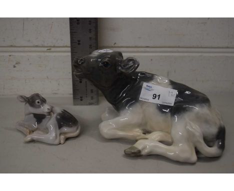 ROYAL COPENHAGEN MODEL OF A SEATED COW AND CALF