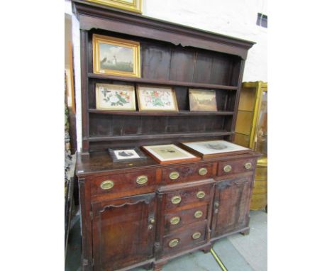 GEORGIAN OAK HIGH BACK DRESSER, oak breakfront with twin cupboard and central nest of 3 graduated drawers, below 3 frieze dra