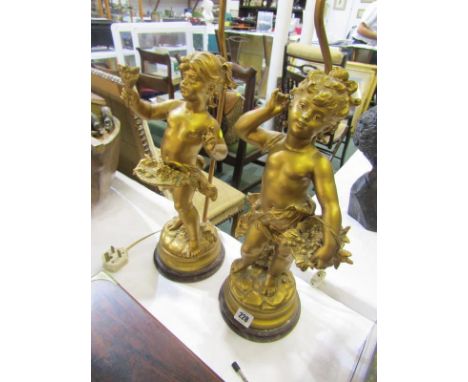 LIGHTING, pair gilded putti figure based table lamps, 18" height 