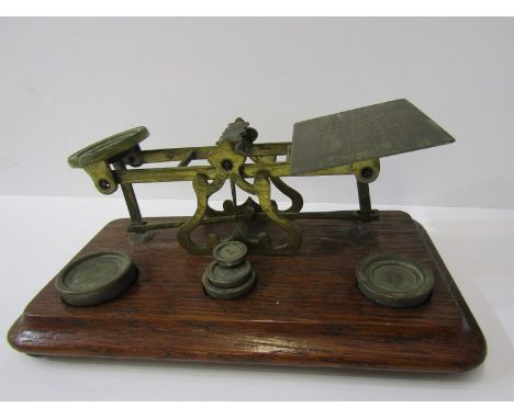 POSTAL SCALES, oak base brass balance scales by S Mordan with 5 graduated weights 
