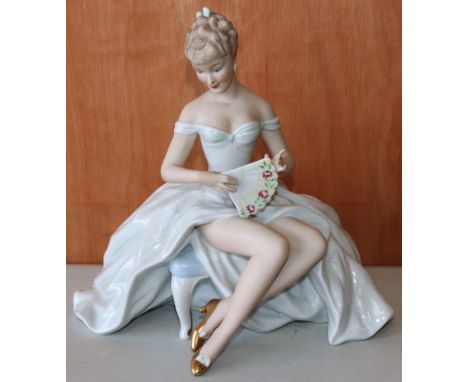 Large Wallendorf porcelain figure of a seated lady with fan, H25cmShipping £38.00 plus vat (UK Only)