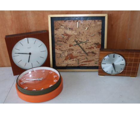 Collection of 1960s/1970s clocks, comprising orange Metamec wall clock, Junghans Ato-mat wall clock, Smiths mantle clock, and