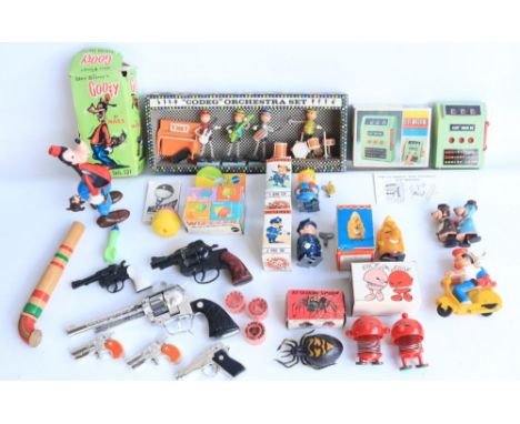 Mixed collection of vintage toys and novelties to include a boxed battery operated slot machine from WACO (tested and not wor