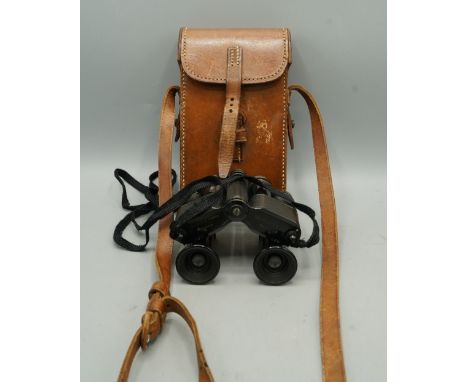 First World War period Negretti & Zambra London folding binoculars with leather caseShipping £33.00 plus vat (UK Only)