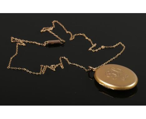 A 9ct gold locket on 9ct gold chain. 6.87g gross.  