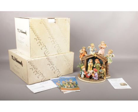 A Danbury Mint MJ Hummel modular Nativity scene. Comprising of two parts : O Holy Night &amp; Heavenly Choir (Boxed).  Condit