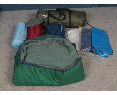 A vintage six man tent and contents. To include two mattresses and three sleeping bags etc.  Condition. Not put up.