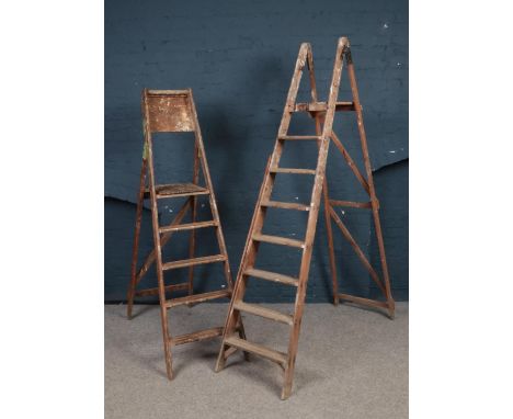 Two pair of wooden step ladders. Comprising of a 'Standfast' pair. Tallest pair: H:201cm.  Condition fair. Repair made on one