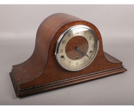 An oak cased Norland mantel clock. Westminster and Whittington chiming.  Running. Not chiming.