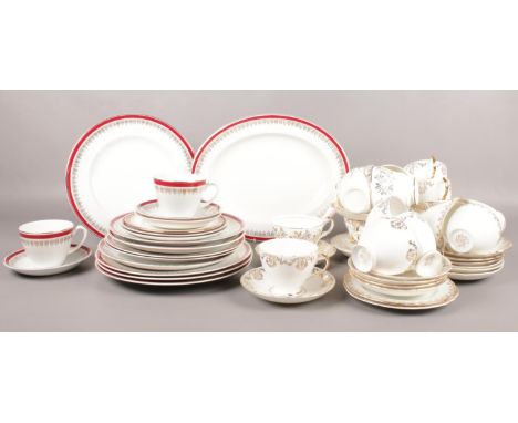 Two ceramic part tea sets. cups/saucers, dinner plates etc.  
