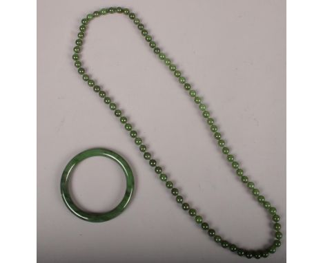 A Jade beaded single string necklace (38cm length) &amp; a Jade bangle (8cm diameter)  