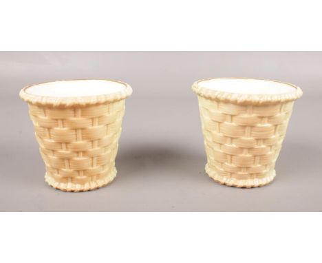 Two Royal Worcester blush ivory baskets. G857 stamped marks to base. 8cm height.  