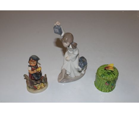 A Japanese preserve pot and cover; a Hummel figure and a Nao figurine