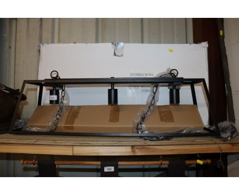 An as new light fitting with original box 