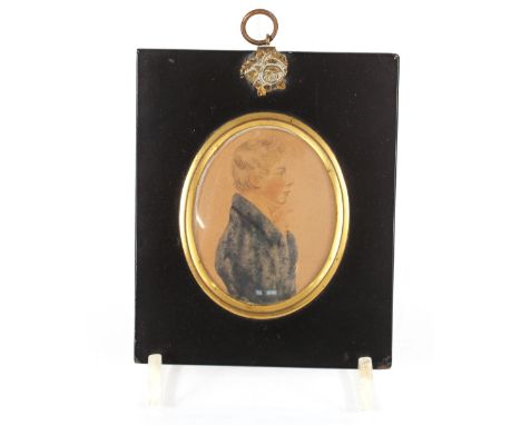 A 19th Century miniature portrait of a young woman with lace trimmed dress and another of a gentleman, inscribed verso "John 