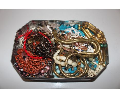 A tin of vintage necklaces including Art Deco style, Murano glass type etc.