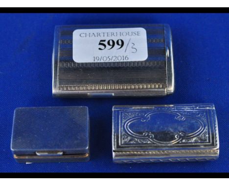 A Victorian silver snuff box, with engraved decoration, Birmingham 1876, another silver snuff box, and a silver vesta (3)
