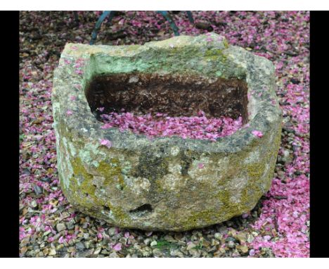 A D shape stone trough, 63 cm wide