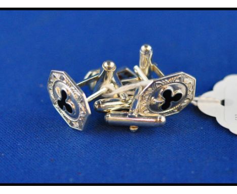 Two pairs of silver and enamel gaming cufflinks