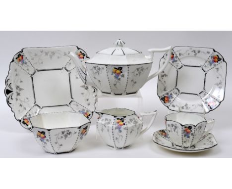 A Shelley Peaches & Grapes pattern Queen Anne shape tea set, for six people, including a teapot and cover, 11498  See illustr
