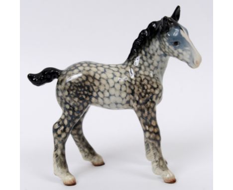 A Beswick Large Shire Foal, rocking horse grey, 951, gloss  See illustration Condition report Report by NG

Some very slight 