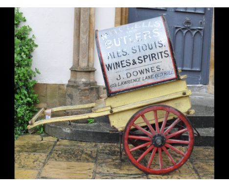 A 19th century painted wood cart, with a domed roof, sign written Mitchells and Butlers Ales, Stouts, Wines & Spirits, 147 cm