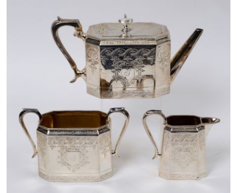 A Victorian silver three piece tea set, initialled, and with engraved decoration, London 1878, approx. 38.8 ozt (3)  See illu