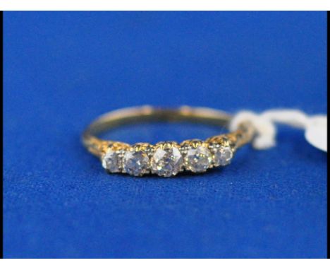 An 18ct gold and five stone diamond ring, approx. ring size R