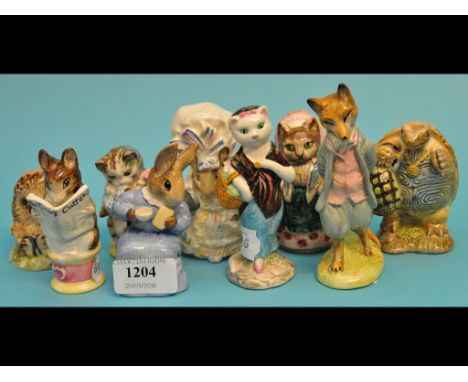 Nine Beswick Beatrix Potter figures, including Susan and Old Mr Prickepin, all BP-3b (9)