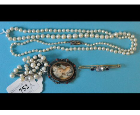 A single strand pearl necklace, a pearl brooch, a pendant set an oval bust portrait miniature, and a bar brooch (4) Condition