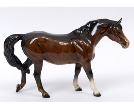 A Beswick Walking Pony, brown, 1516, gloss (one leg and ears glued)  See illustration