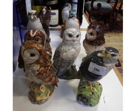 A Royal Doulton Whyte & Mackay Scotch whisky flask, Barn Owl, 2809, with contents, and eight others similar (9)
Specialist de