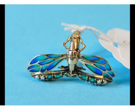 An Art Nouveau style 9ct gold enamel, diamond and emerald dragonfly ring, approx. ring size n