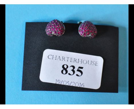 A pair of ruby set heart shape earrings