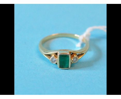 An 18ct gold, emerald and diamond ring, approx. ring size M