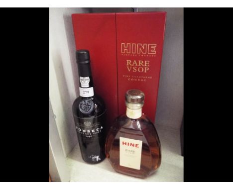 A bottle of Fonseca vintage port, 1992, and a bottle of Hine Rare VSOP Fine Champagne Cognac, in a presentation box with glas