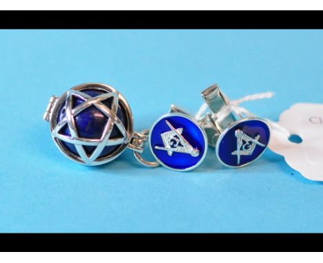 A silver and enamel masonic fob, with matching cufflinks