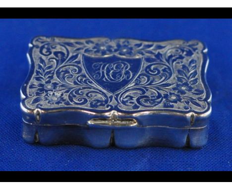A late Victorian silver snuff box, initialled, and with acanthus leaf decoration, Birmingham 1897, approx. 1.8 ozt, 5.5 cm wi