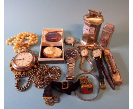 An oval cameo brooch, a muff chain, other jewellery, a lady's Omega wristwatch, other watches, a silver table cigarette light