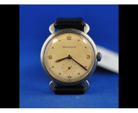 A gentleman's stainless steel Jaeger-LeCoultre wristwatch, the champagne dial with Arabic numerals and subsidiary seconds dia