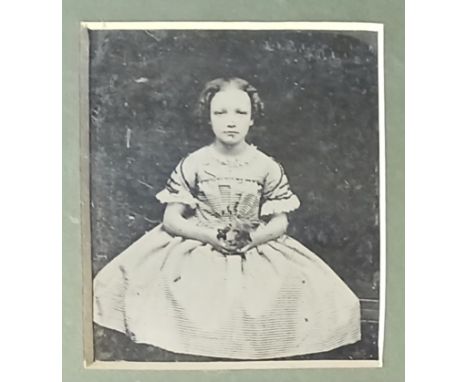 PHOTOGRAPHY. A collection of 23 ambrotype [collodion positive] family portraits, unknown sitters, mounted, framed and glazed,
