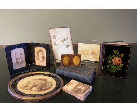 PHOTOGRAPHY. A miscellaneous collection comprising: A Victorian carte-de-visite album containing 6 family portraits taken by 