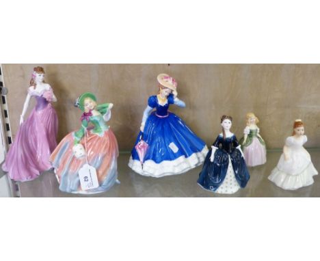 A collection of six figurines including Royal Doulton Autumn Breezes, Royal Doulton figure of the Year Mary, Debbie, Kerry, P