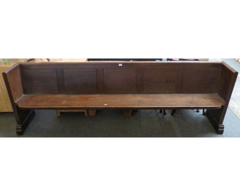 A Victorian pitch pine large five-panel back pew, 259cm long