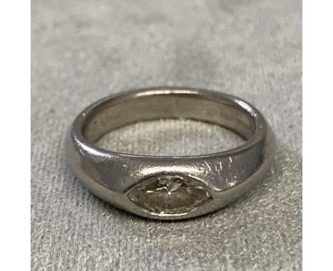 Platinum and diamond dress ring, marquis cut diamond in a rub over setting, 6g, size K 