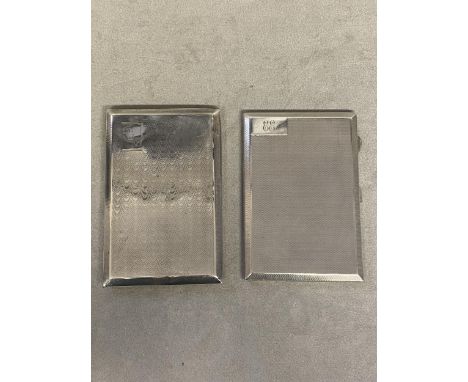 Two sterling silver engine turned cigarette cases, with gilt interiors, 11.7 ozt 