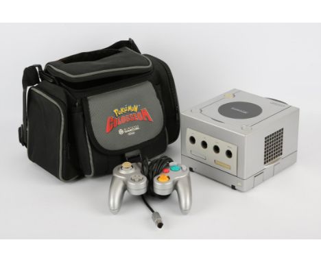 Nintendo GameCube Console Silver (DOL-101-EUR) inside a Pokémon Colosseum carry case, w/Platinum Controller (DOL-003), power 