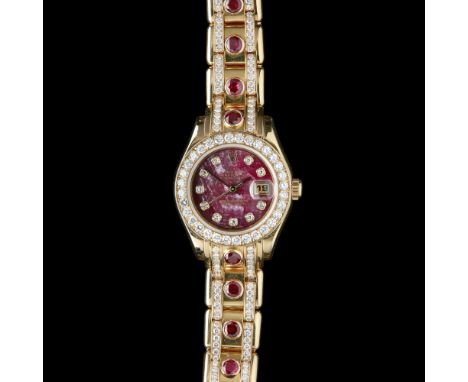 ROLEX - An 18ct gold ruby and diamond set lady's wrist watch  Oyster Perpetual Datejust, Ref. 69298, diamond set bezel, ruby 